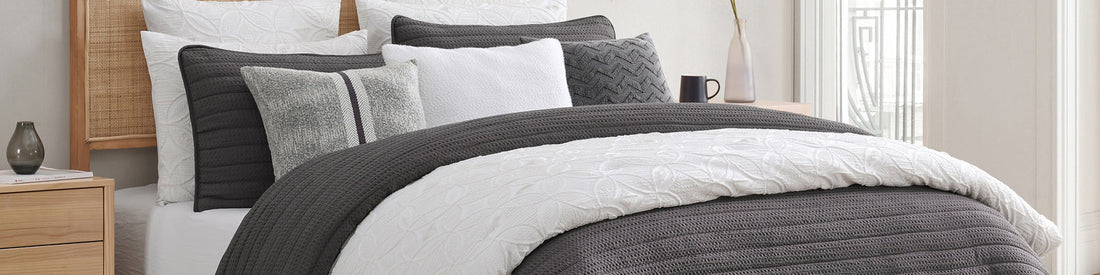 The Fresno Comforter Set in raised circular jacquard paired with the Monterey Quilt Set in dimensional waffle weave.