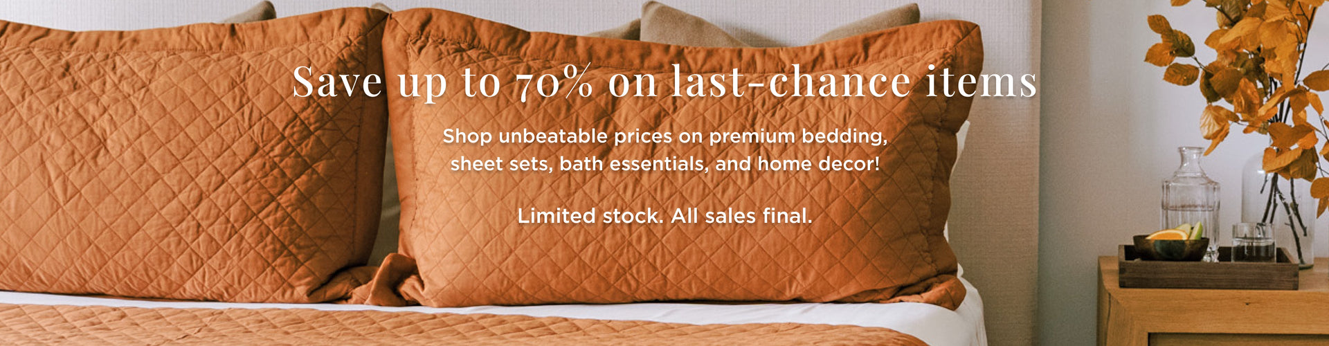 Layered bed with sheets, duvet, and diamond coverlet